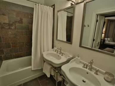 double vanities and tub in bathroom