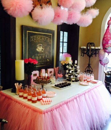 baby shower with many pink decorations